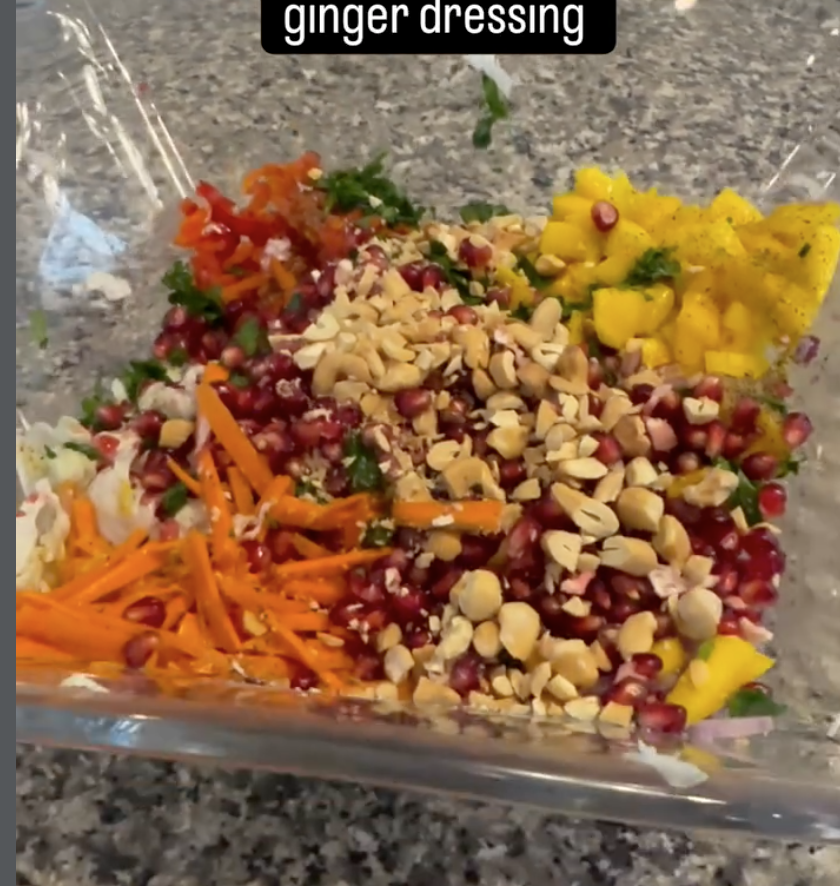 Vegan cabbage, carrot, mango & pomegranate salad with an orange-ginger dressing